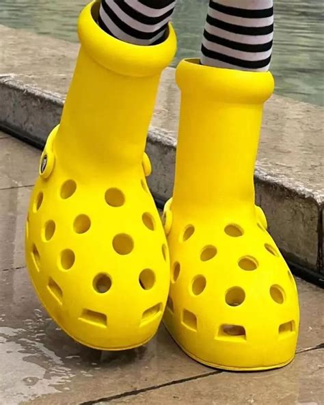 crocs yellow big boots.